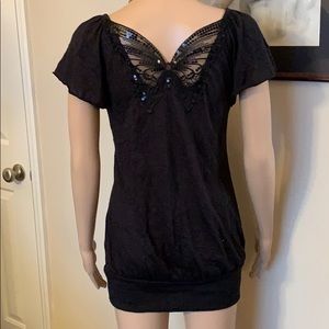 Black top with black glittering butterfly